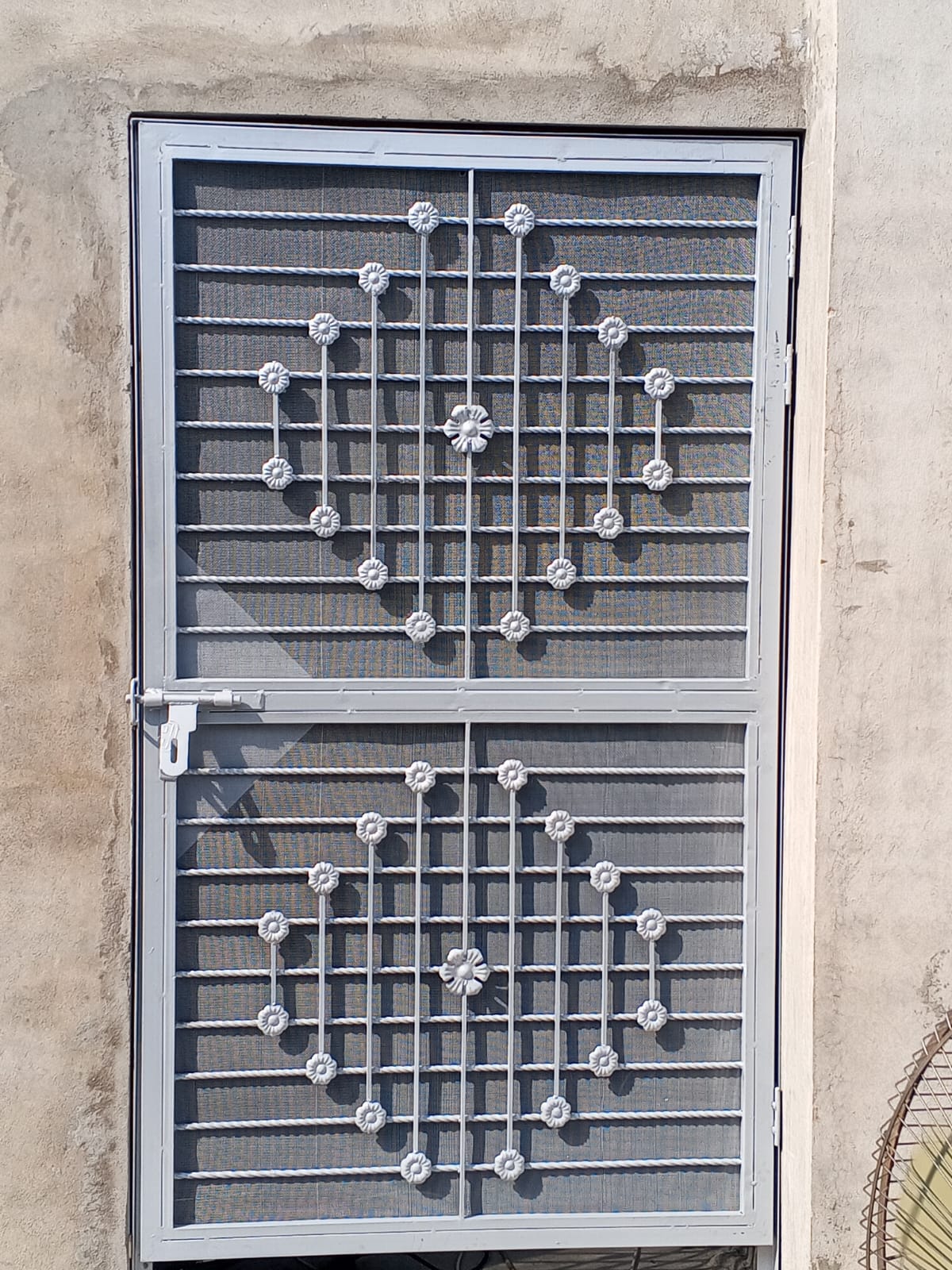 White safety window grill door with flower pattern, Lala Musa